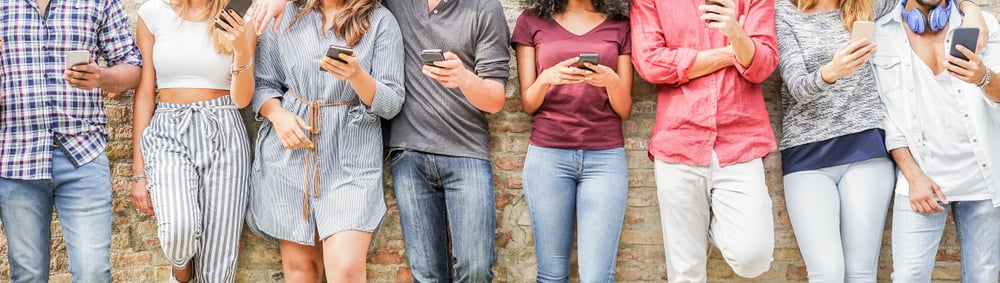 A crowd of people on phones