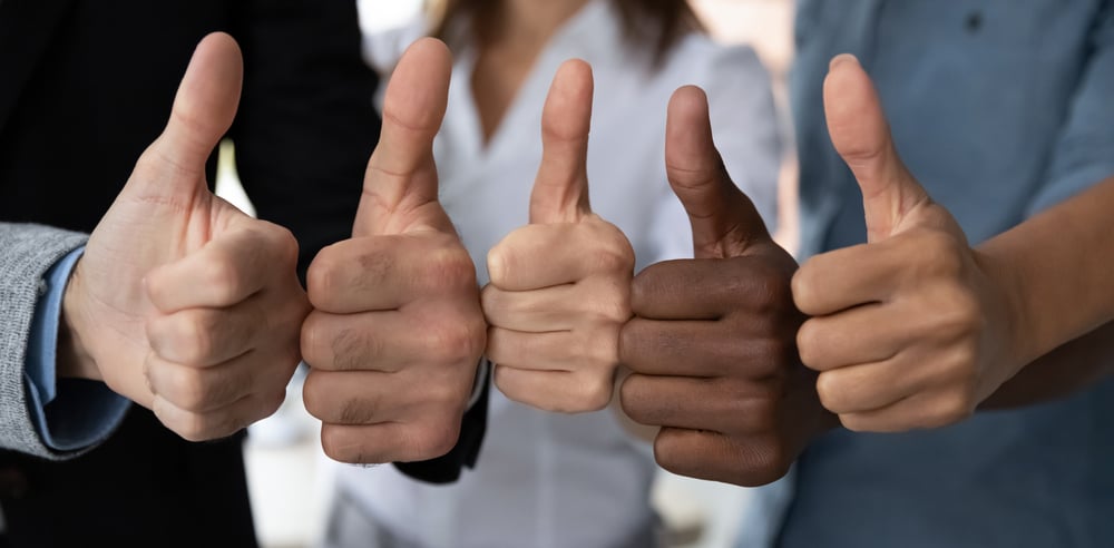 People giving a thumbs up gesture