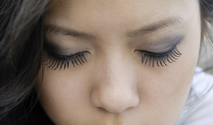 Closed eyes of young Asian-American woman with long eyelashes.jpeg